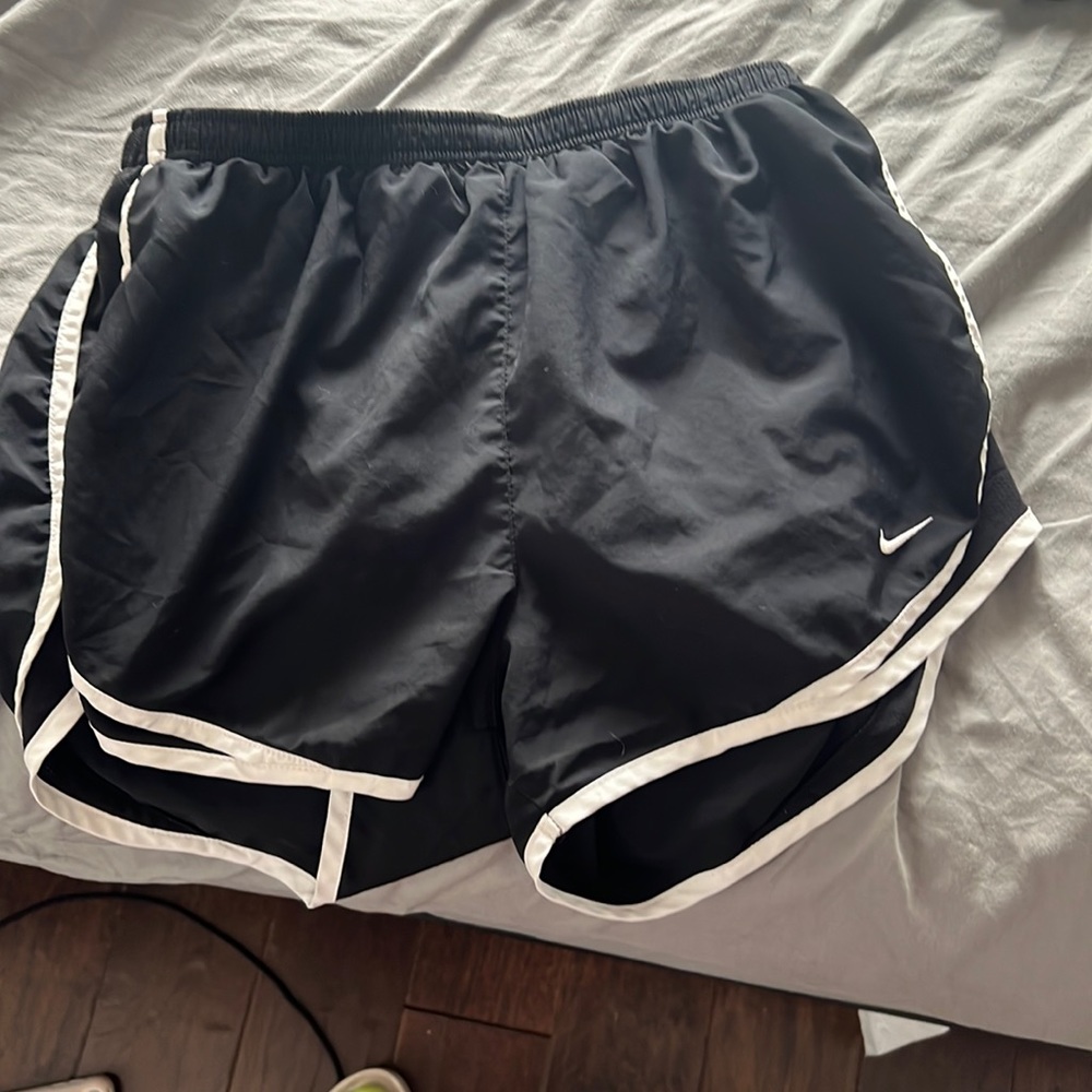 Black. Very cute in good condition. Nike athletic shorts.